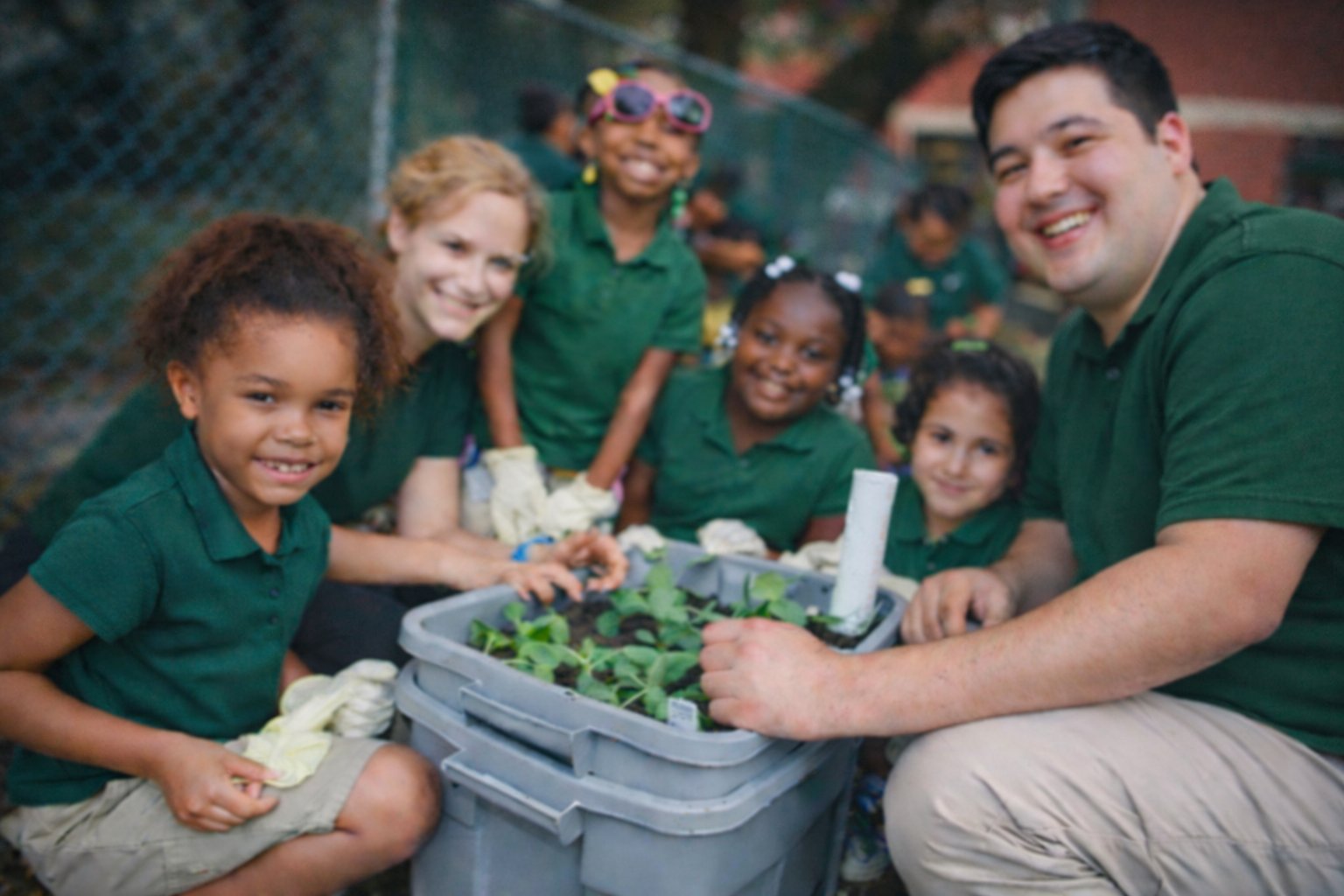 Max working in school garden with students